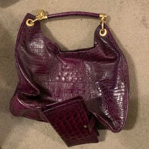 Purple leather Brahmin handbag and matching wallet.